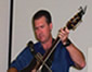 Preacher Fred, guitar in hand worships the Lord!